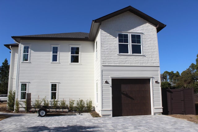 view of front of property with a garage