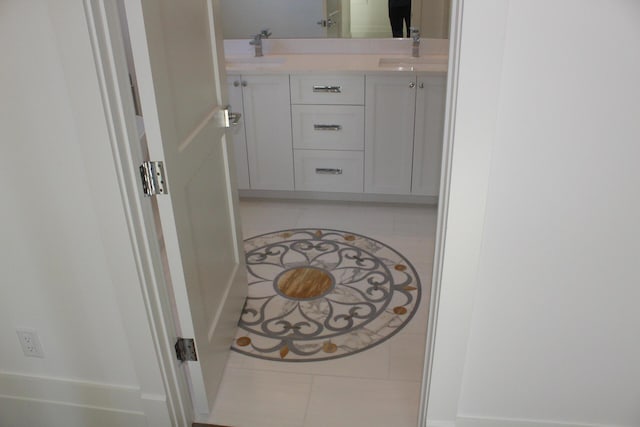 bathroom with vanity and tile patterned floors