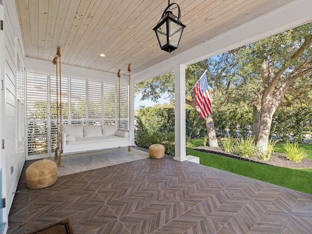 view of patio featuring a porch