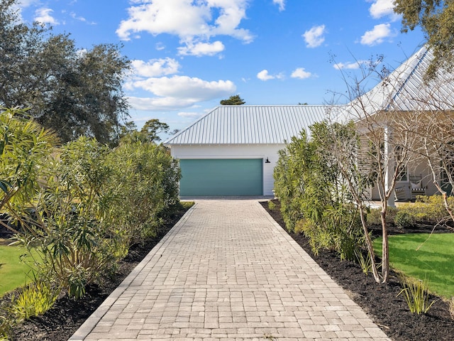 view of front of property featuring a garage