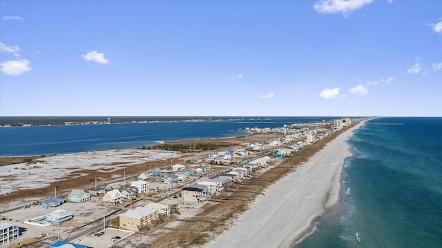 bird's eye view featuring a view of the beach and a water view