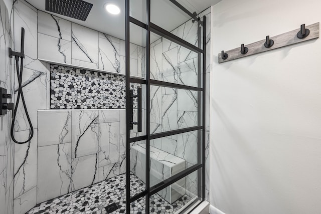 interior space with tiled shower