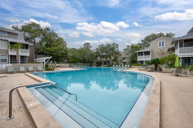 view of pool featuring a patio area