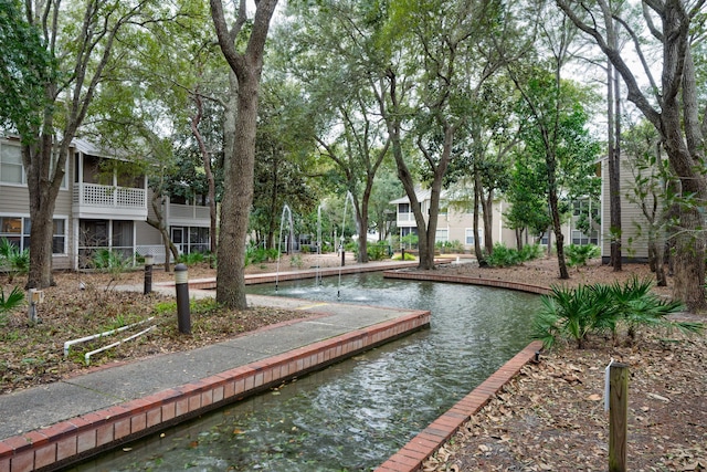 view of home's community featuring a water view