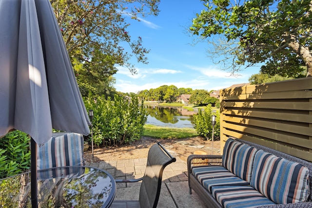 view of patio / terrace with a water view