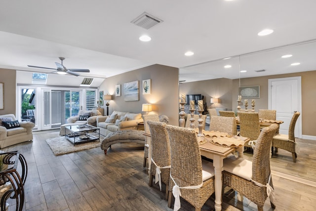 dining space featuring ornamental molding, ceiling fan, and hardwood / wood-style floors