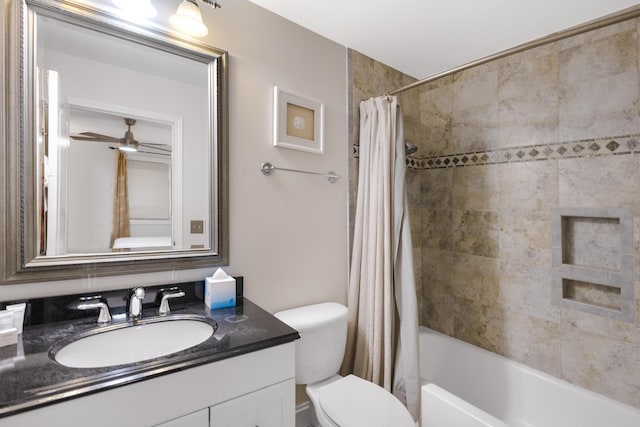 full bathroom featuring vanity, toilet, ceiling fan, and shower / bath combo