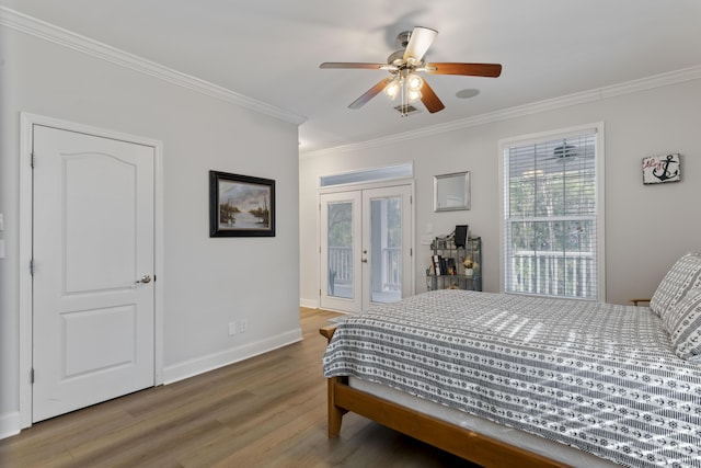 bedroom with hardwood / wood-style floors, access to exterior, ceiling fan, crown molding, and french doors