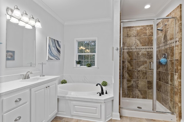 bathroom featuring independent shower and bath, ornamental molding, and vanity