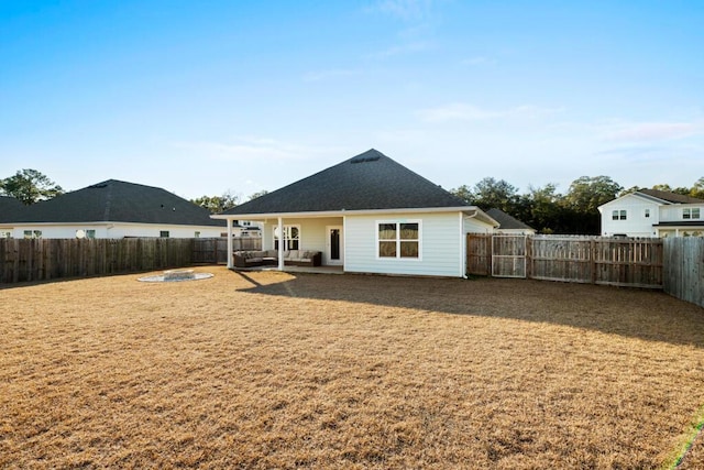 back of property with a patio area