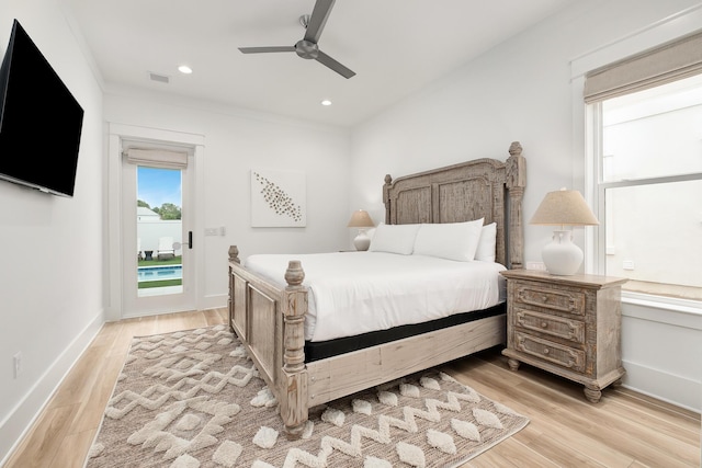 bedroom with light wood-type flooring, access to exterior, ceiling fan, and ornamental molding