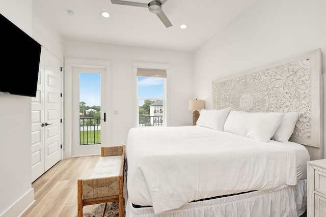 bedroom with light hardwood / wood-style floors, a closet, ceiling fan, and access to outside