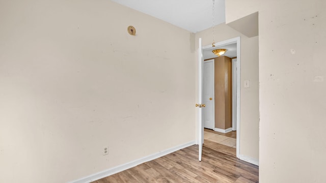 empty room with light wood-type flooring