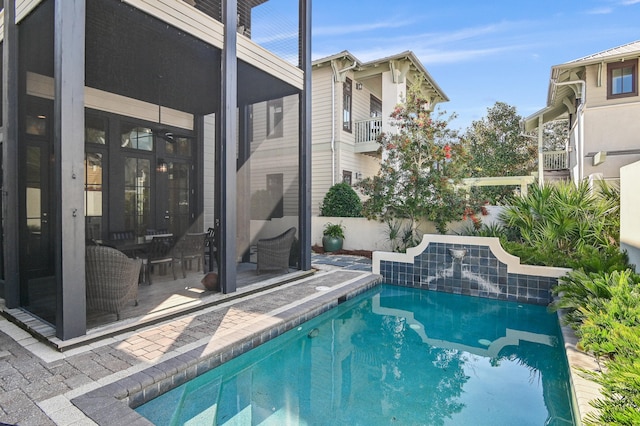 view of pool featuring a patio area