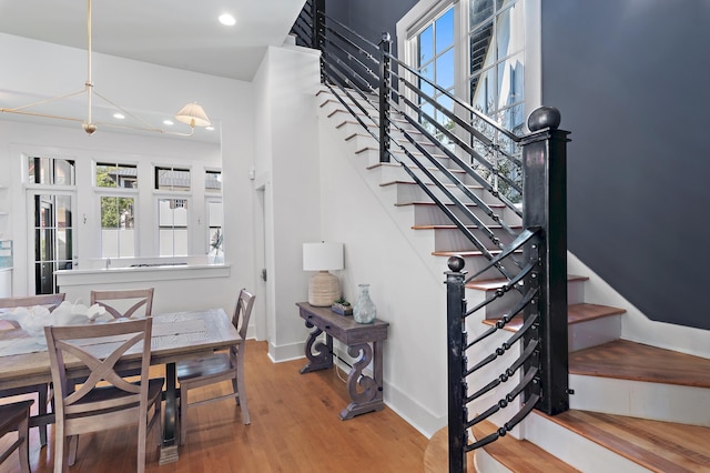 stairway featuring hardwood / wood-style flooring