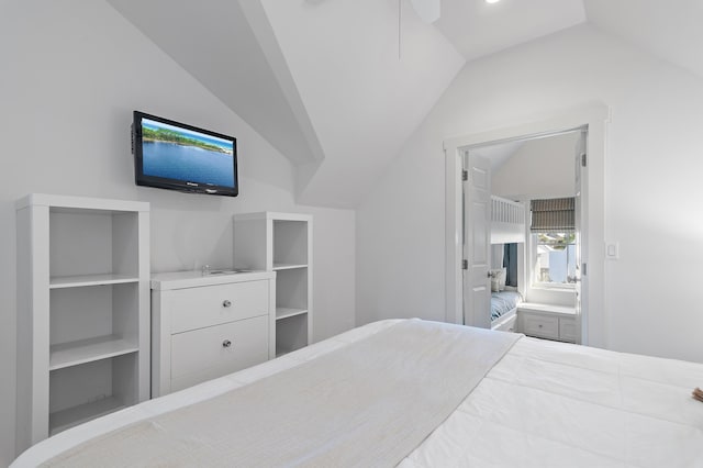 bedroom featuring vaulted ceiling