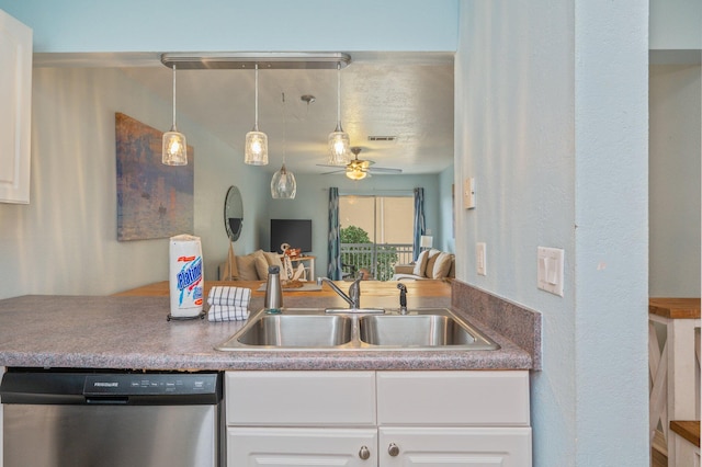 kitchen with pendant lighting, dishwasher, sink, white cabinets, and ceiling fan