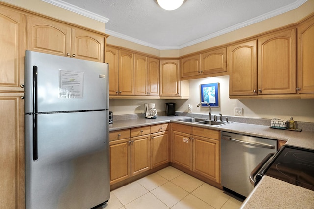 kitchen with ornamental molding, appliances with stainless steel finishes, sink, and light tile patterned floors