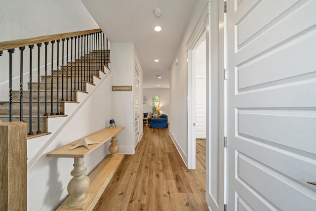 hall featuring light hardwood / wood-style floors