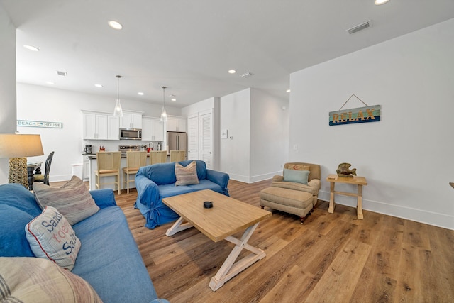 living room featuring light wood-type flooring