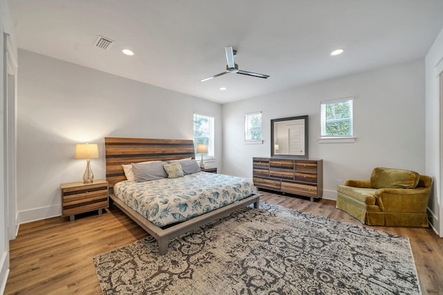 bedroom featuring ceiling fan and light wood-type flooring