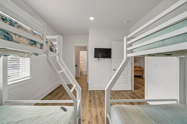 unfurnished bedroom featuring wood-type flooring