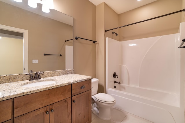 full bathroom featuring tub / shower combination, toilet, vanity, and tile patterned flooring