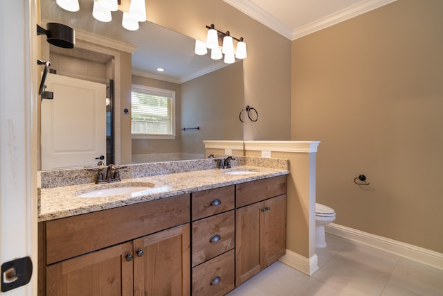 bathroom with tile patterned floors, toilet, ornamental molding, and vanity