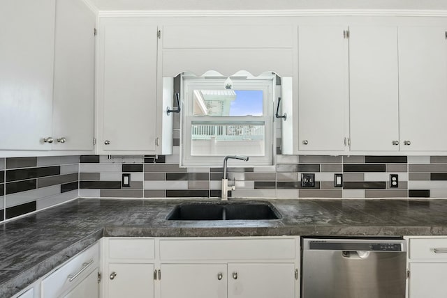 kitchen featuring sink, white cabinetry, backsplash, and dishwasher