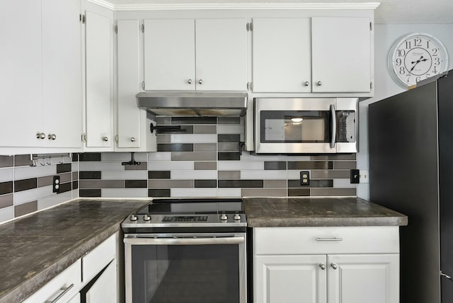 kitchen with white cabinets, stainless steel appliances, and backsplash