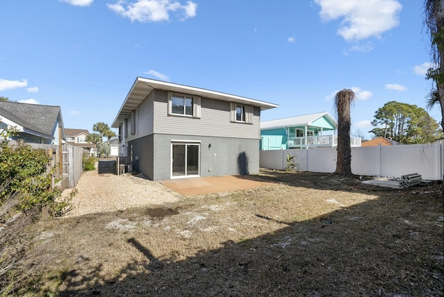 rear view of house featuring a patio area