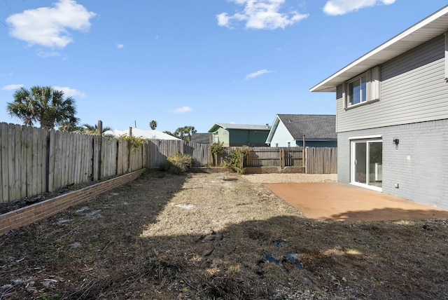 view of yard with a patio area