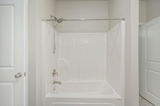 bathroom featuring washtub / shower combination