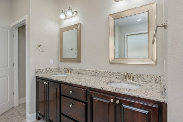 bathroom featuring vanity and tile patterned floors