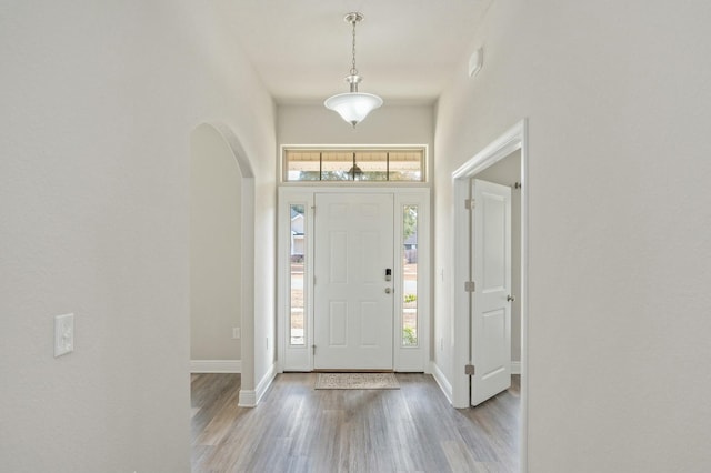 entryway with light hardwood / wood-style floors