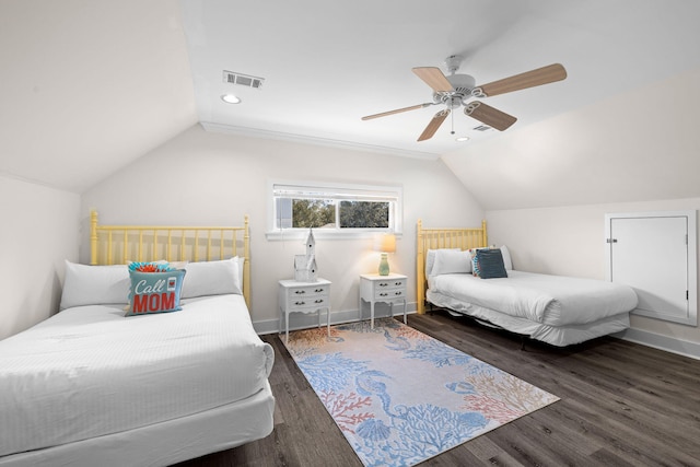 bedroom featuring vaulted ceiling, dark hardwood / wood-style floors, and ceiling fan