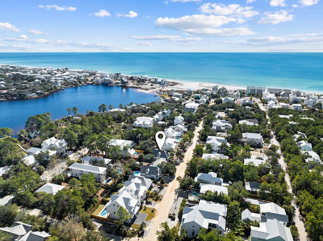 drone / aerial view with a water view