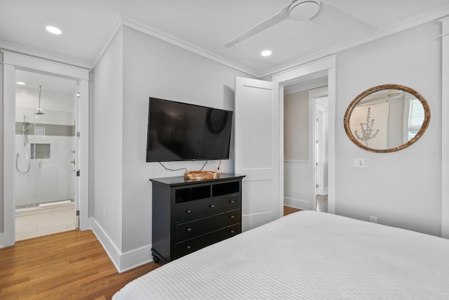 bedroom with hardwood / wood-style flooring, ensuite bathroom, ornamental molding, and ceiling fan