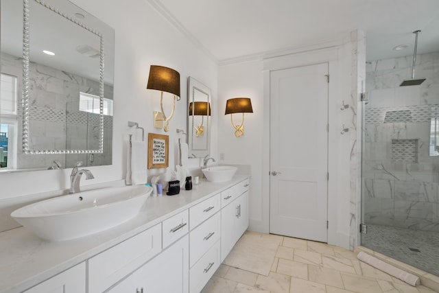 bathroom with crown molding, a shower with shower door, and vanity