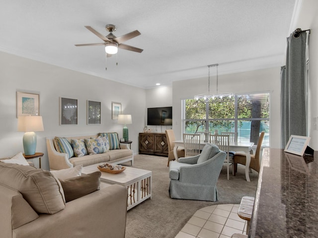 tiled living room featuring ceiling fan