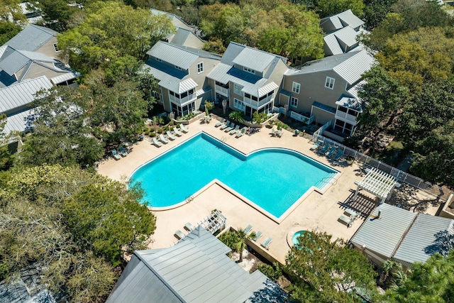 view of swimming pool with a patio