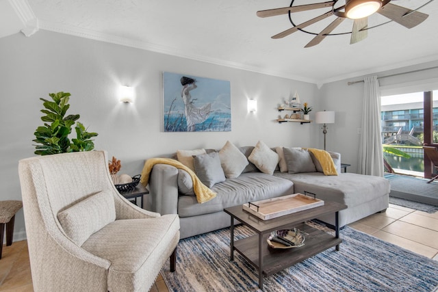 tiled living room featuring ornamental molding and ceiling fan