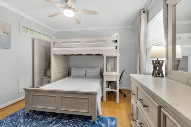 bedroom with multiple windows, crown molding, light hardwood / wood-style floors, and ceiling fan