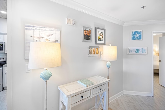 room details featuring hardwood / wood-style floors, crown molding, and stainless steel appliances