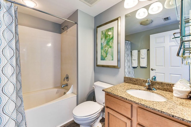 full bathroom with shower / bath combo with shower curtain, toilet, and vanity