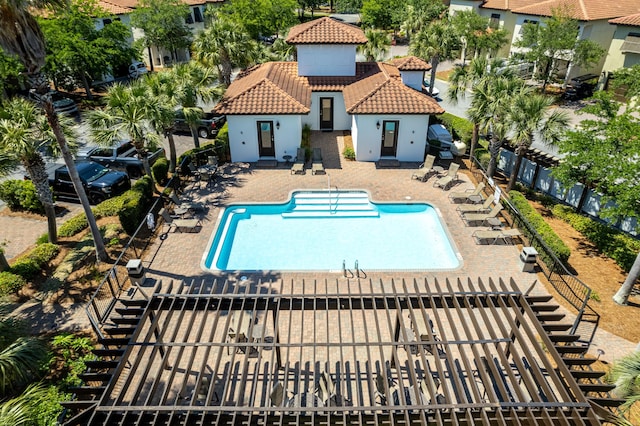 view of pool featuring a patio