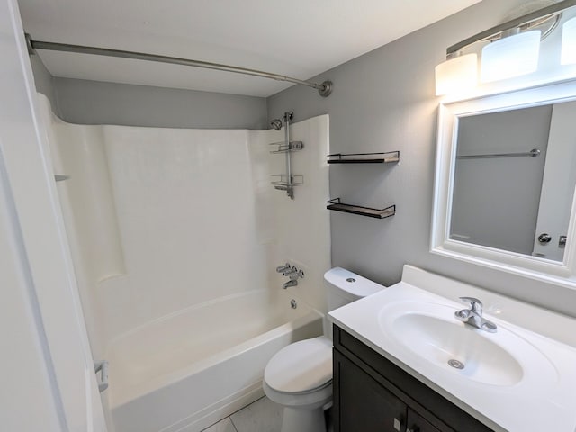 full bathroom featuring tub / shower combination, toilet, vanity, and tile patterned flooring