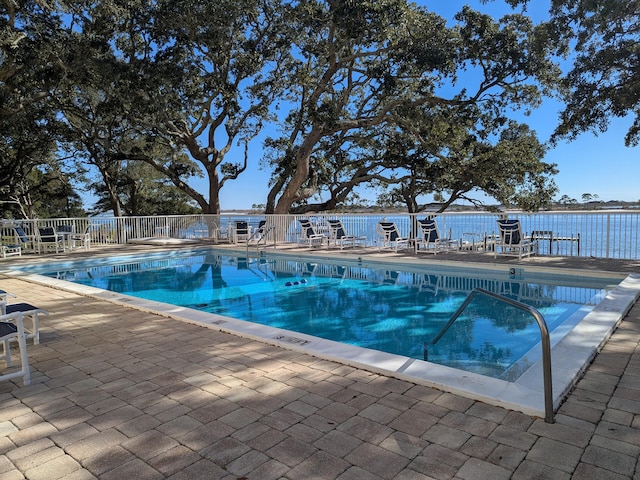 view of swimming pool featuring a patio