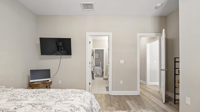 bedroom featuring light hardwood / wood-style flooring