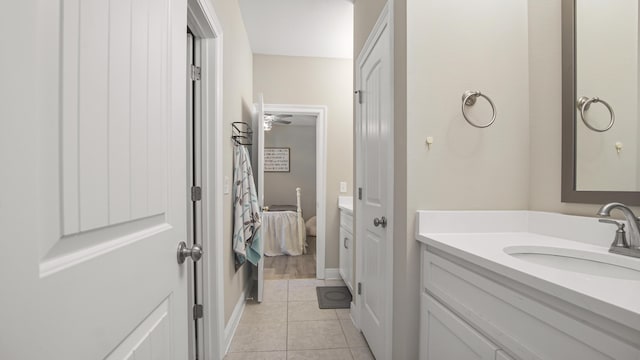 bathroom with vanity and tile patterned floors